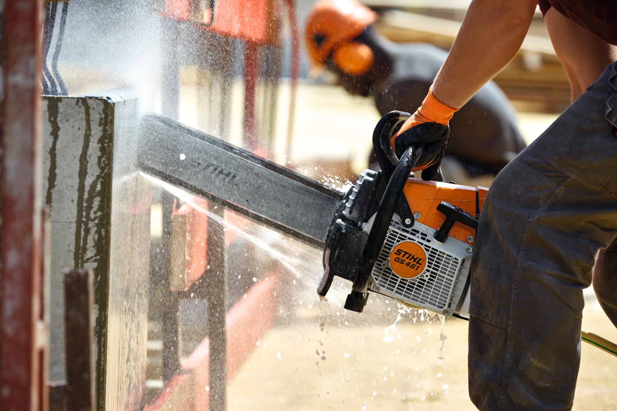 A man using Concrete cutter