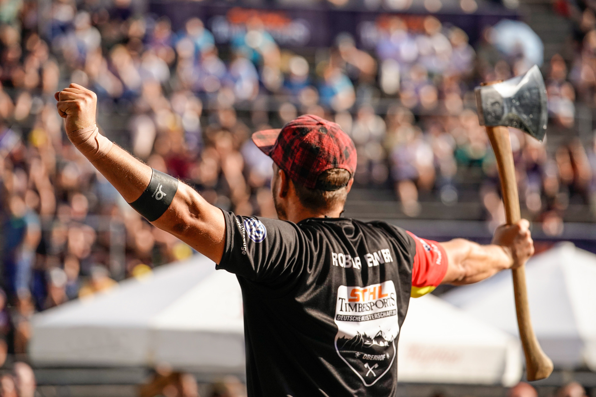 A STIHL TIMBERSPORTS® athlete celebrating